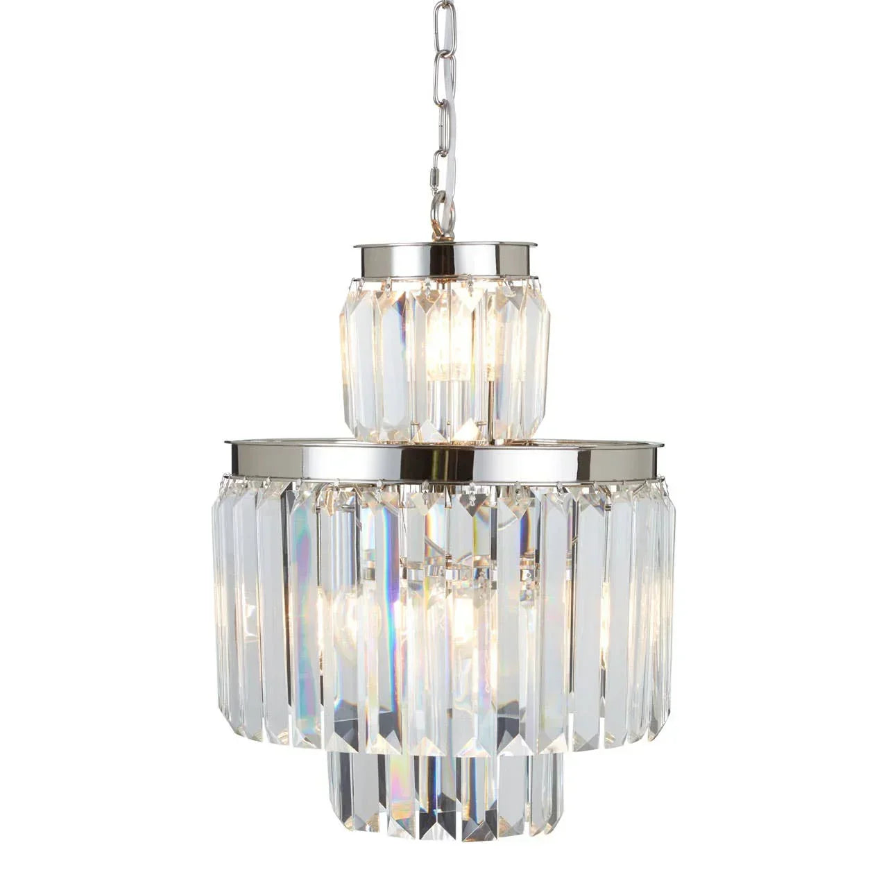 Tiered crystal chandelier with chrome frame and hanging chain, lit with warm bulbs