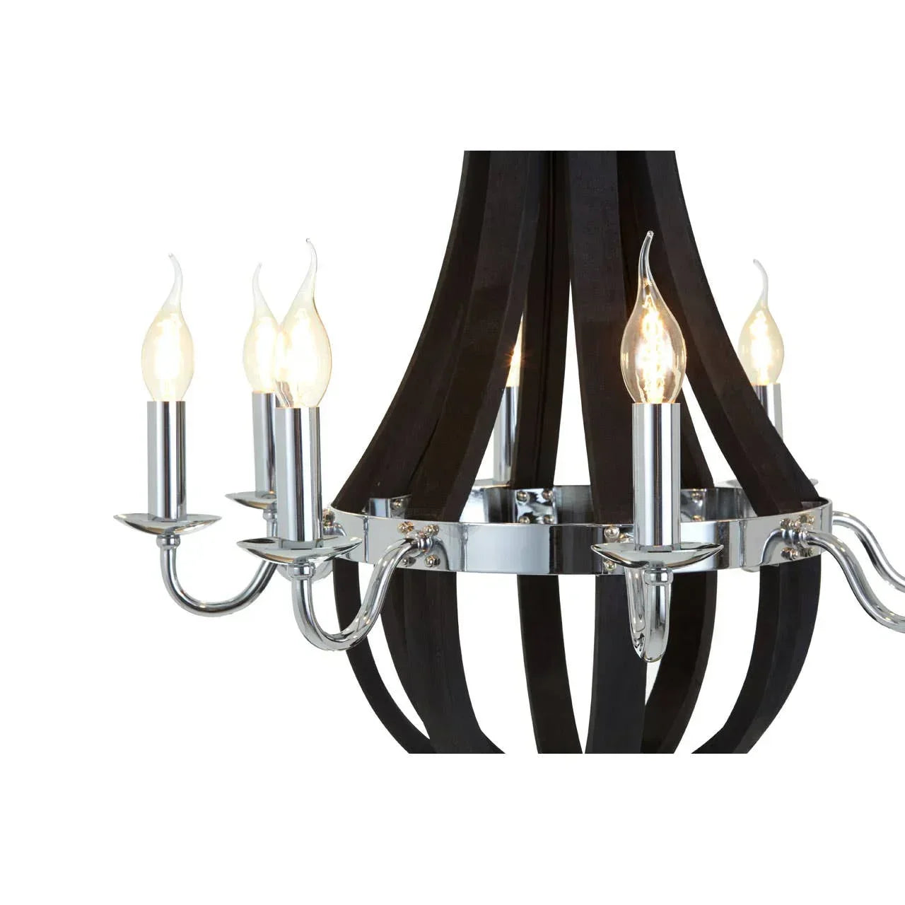 Chrome and wood chandelier with candle bulbs and curved arms, close-up of light fixture