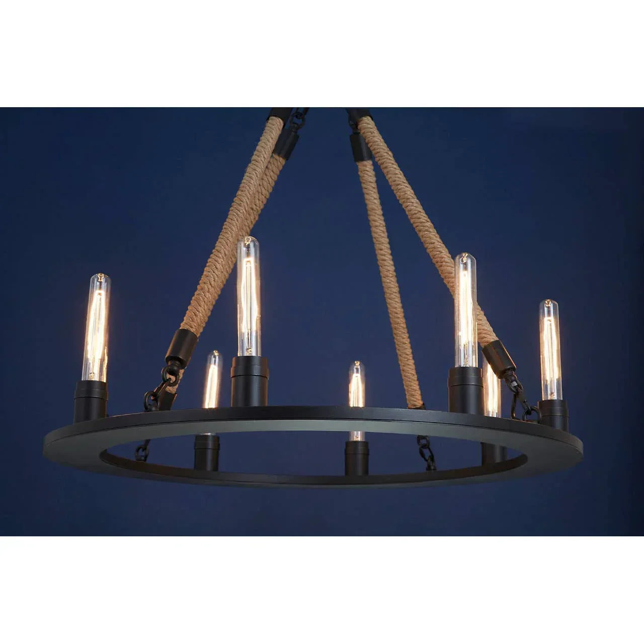 Round black metal chandelier with exposed bulbs and rope suspension against blue background