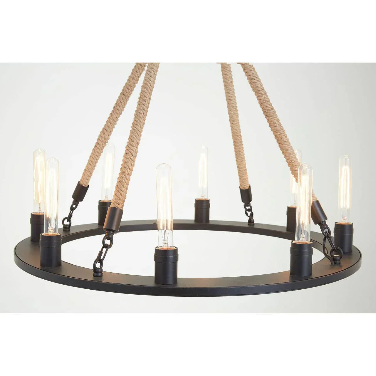 Round black metal chandelier with exposed bulbs and rope suspension detail
