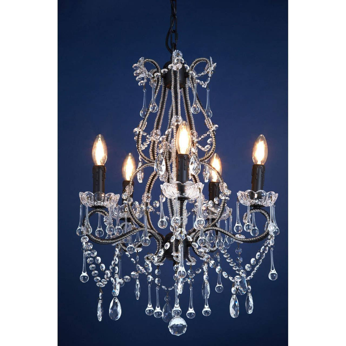 Five light crystal chandelier with black frame and hanging glass beads against blue background