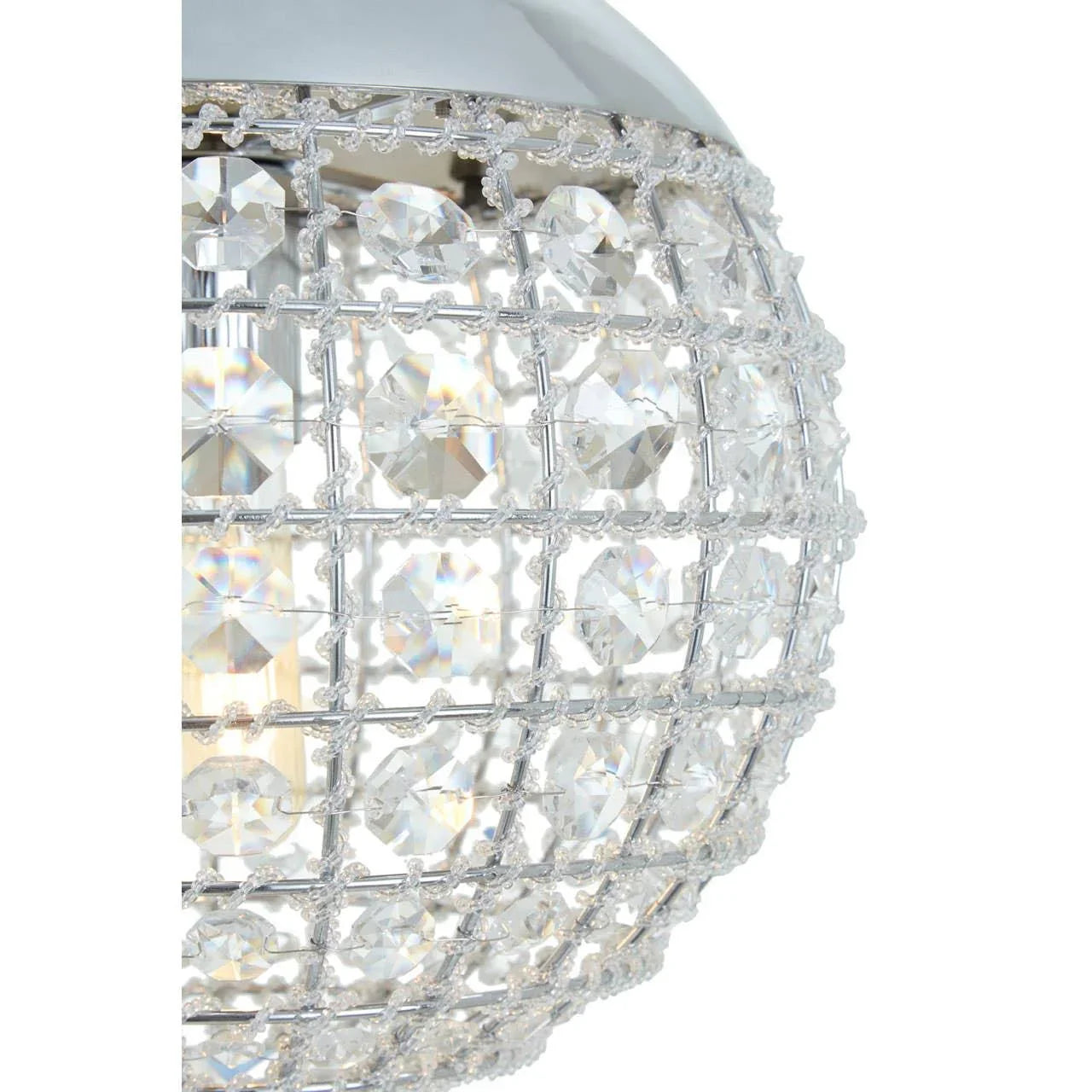 Close-up of crystal ceiling light shade with chrome finish and faceted glass detail