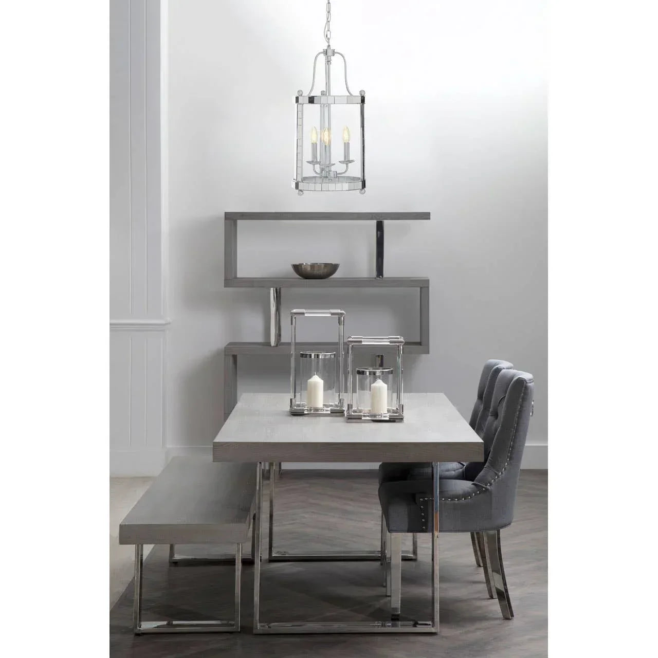 Grey dining table set with fabric chairs, bench seating and modern shelving unit