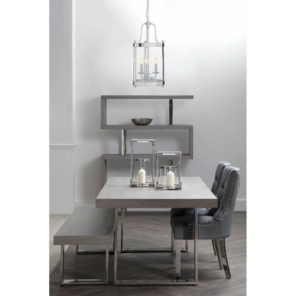 Grey dining table set with fabric chairs, bench seating and modern shelving unit
