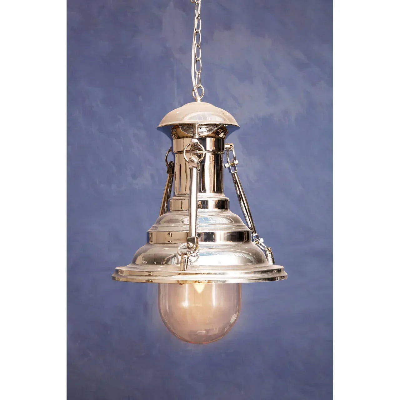 Polished chrome pendant ceiling light with clear glass dome shade and chain suspension