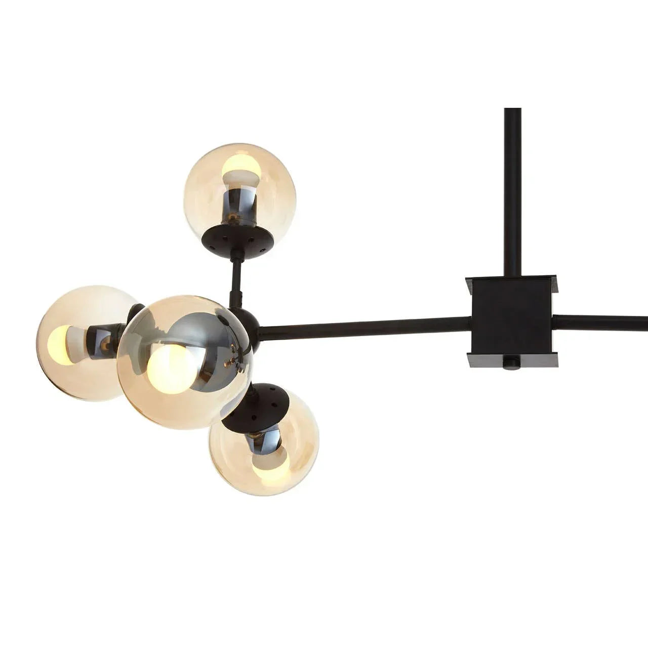 Modern black ceiling light with four glass globe shades and exposed LED bulbs