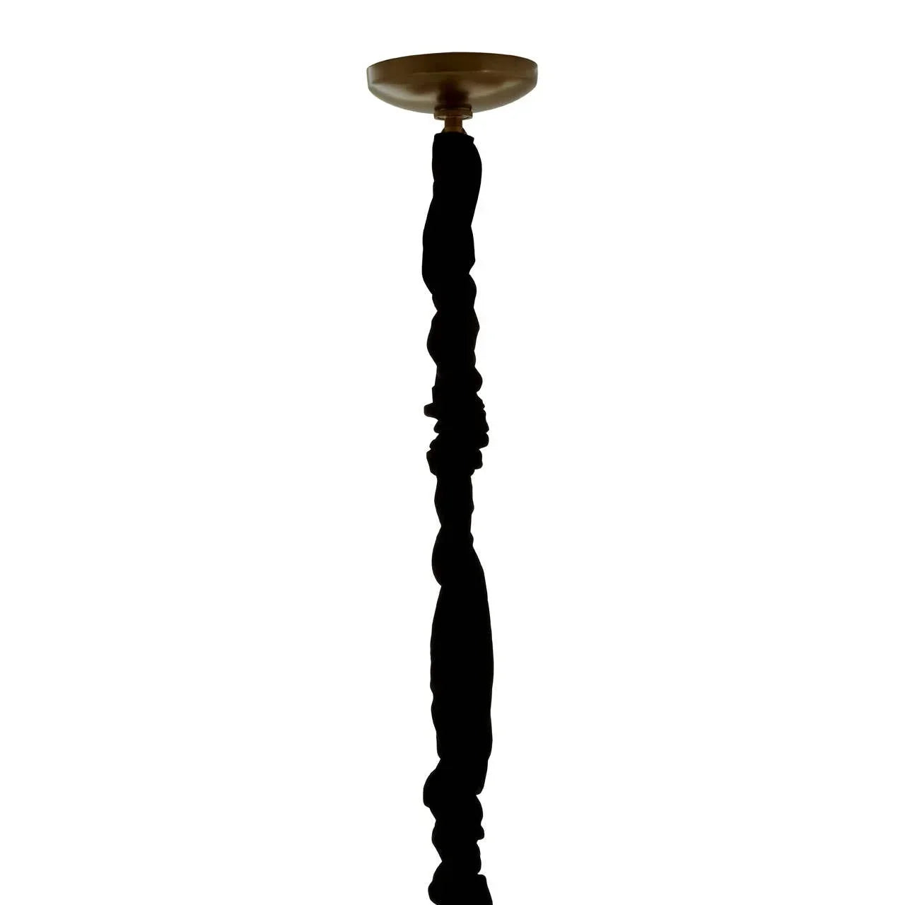 Black twisted wood furniture leg with gold cap on white background