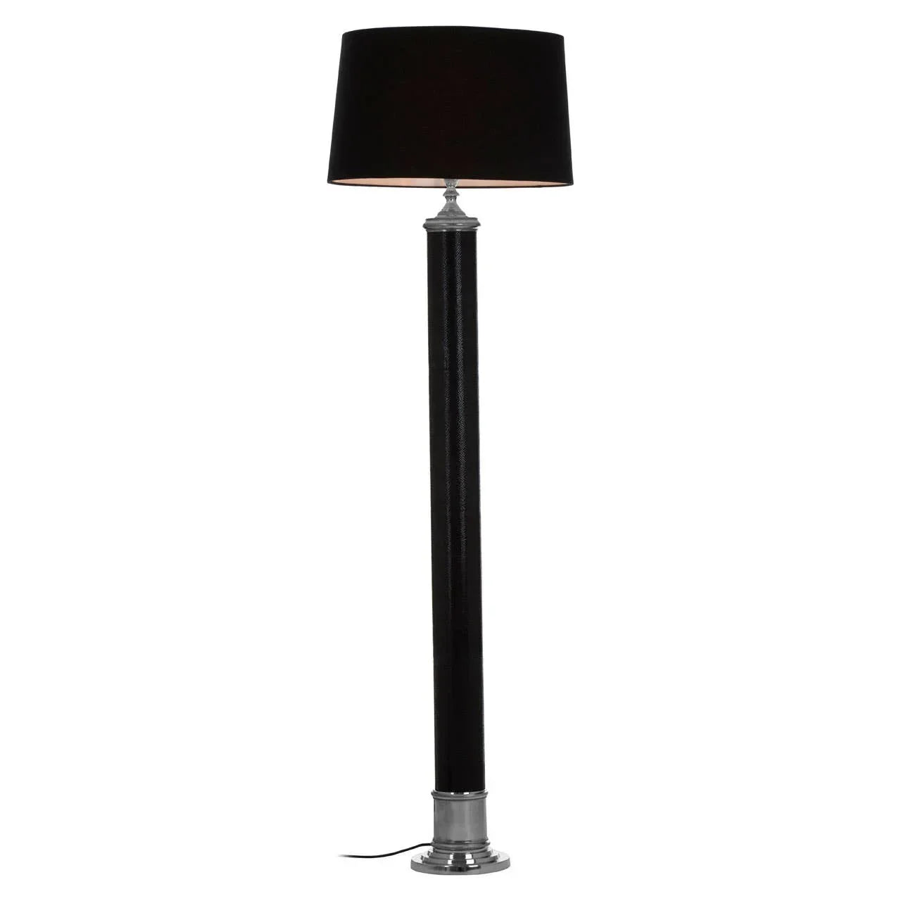 Black floor lamp with cylindrical base and brushed metal accents