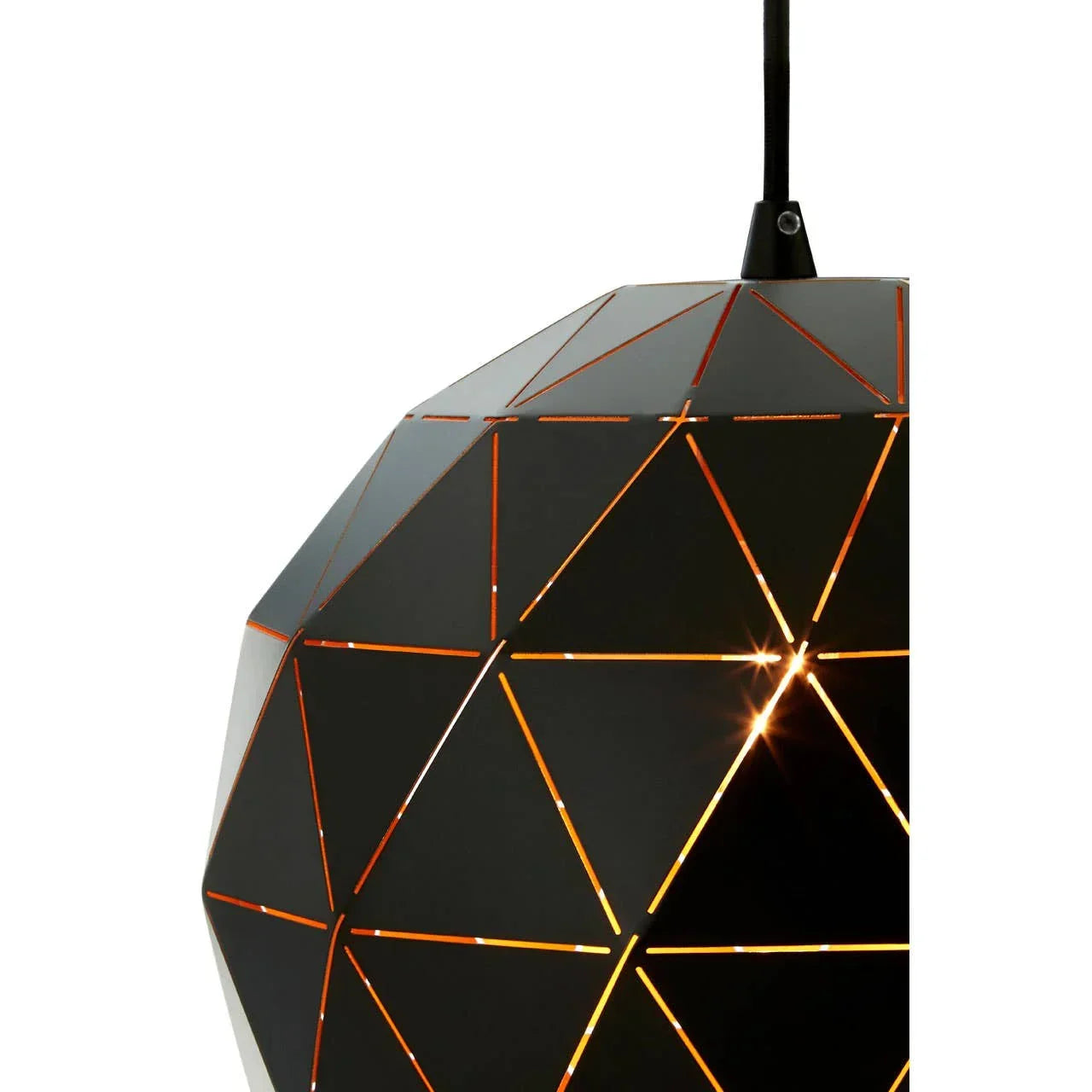 Geometric black pendant light with cut-out pattern glowing warmly