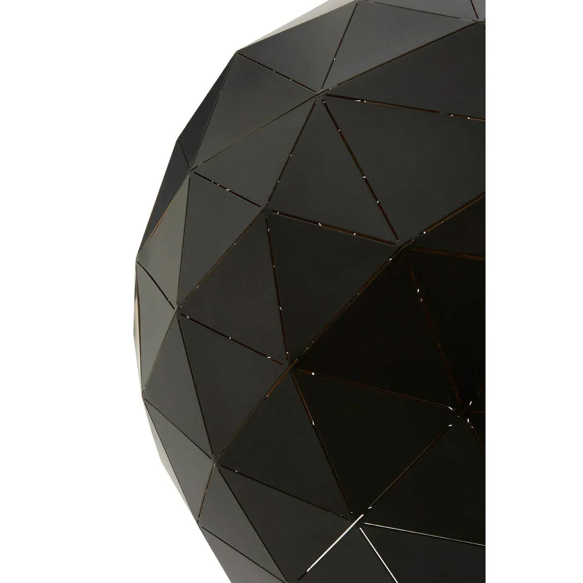 Black geometric metal table with triangular panel detail, close-up of surface texture