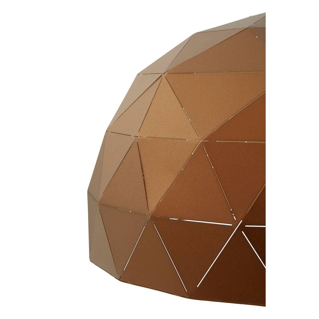 Geometric copper metal fire pit dome with triangle cut-outs, close-up detail view