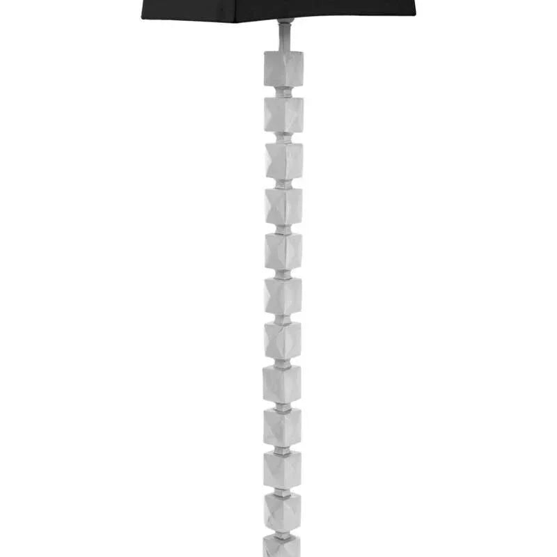 Modern floor lamp with geometric silver base and black rectangular shade