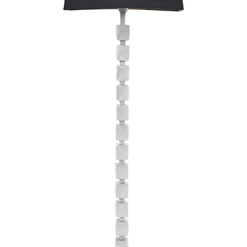Modern floor lamp with white geometric base and black rectangular lampshade front view