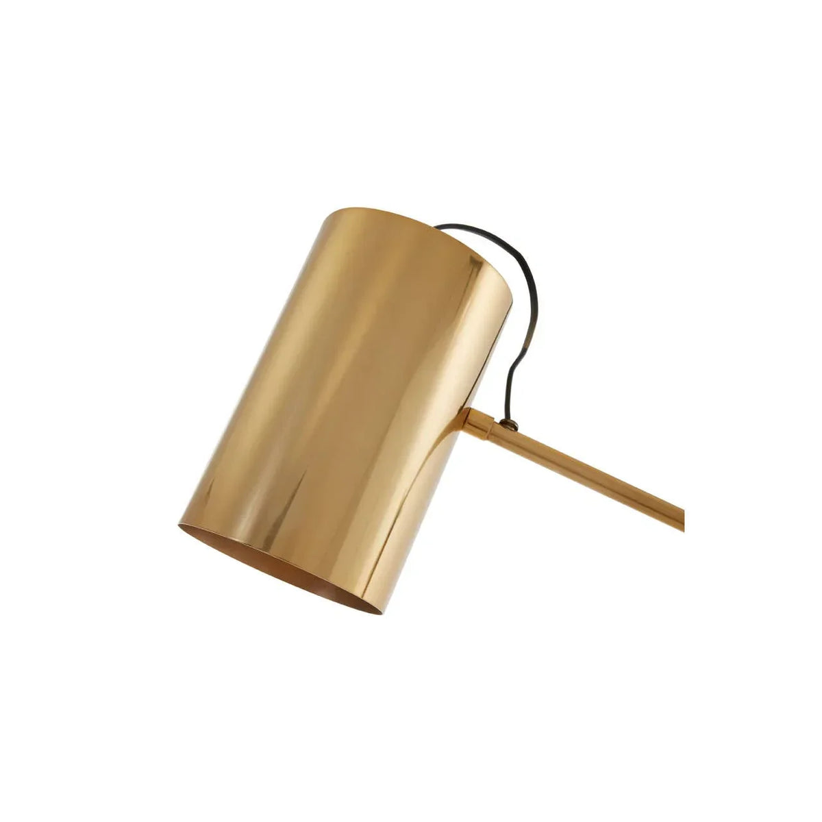 Gold metal cylinder lamp shade with black cable, close-up of modern lighting fixture