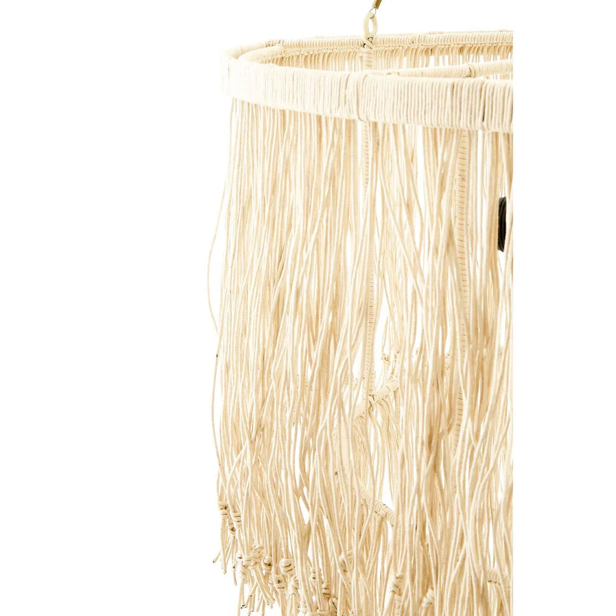 Close-up of cream tasselled fringe detail on a pendant ceiling light