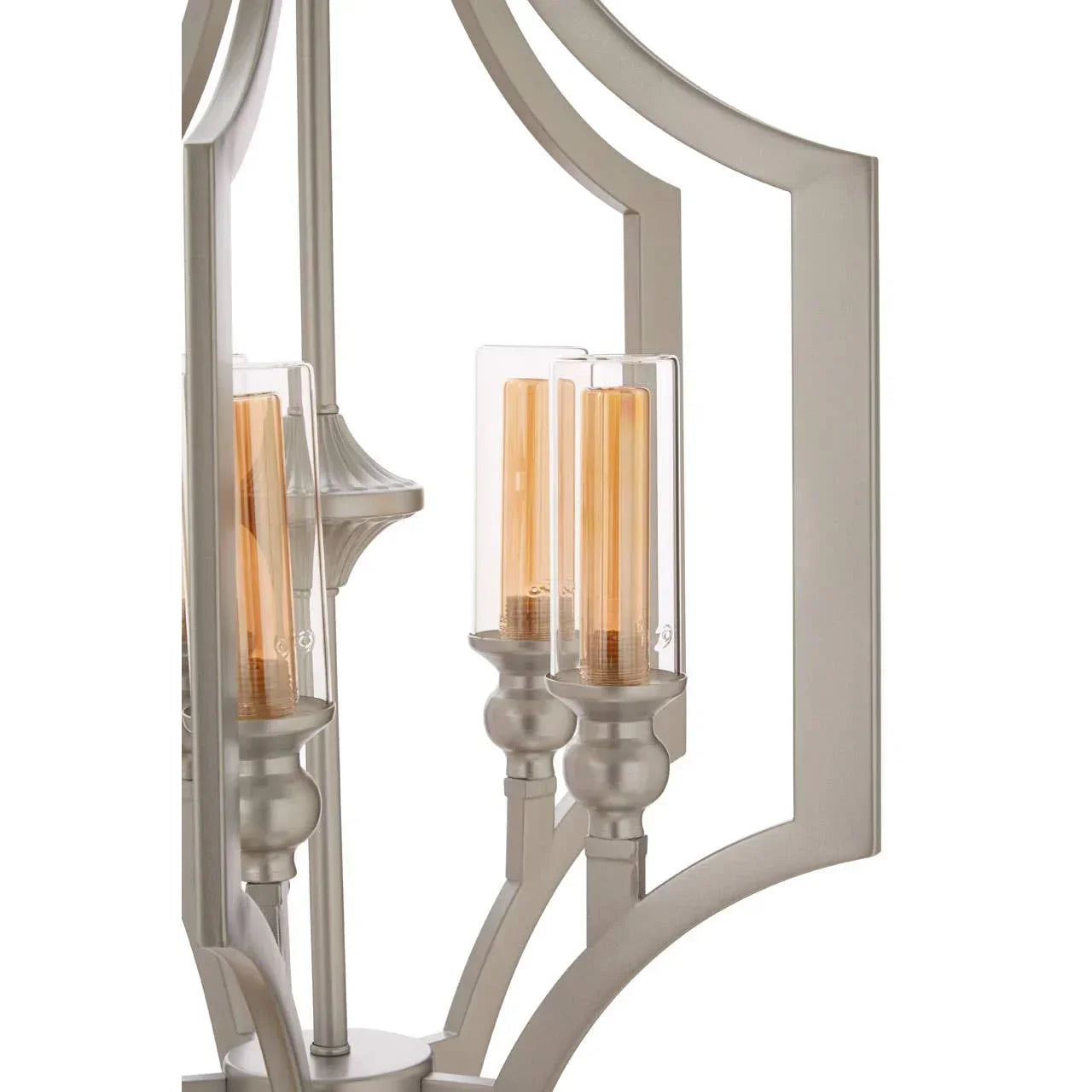 Brushed metal chandelier with clear glass shades and candle-style LED bulbs