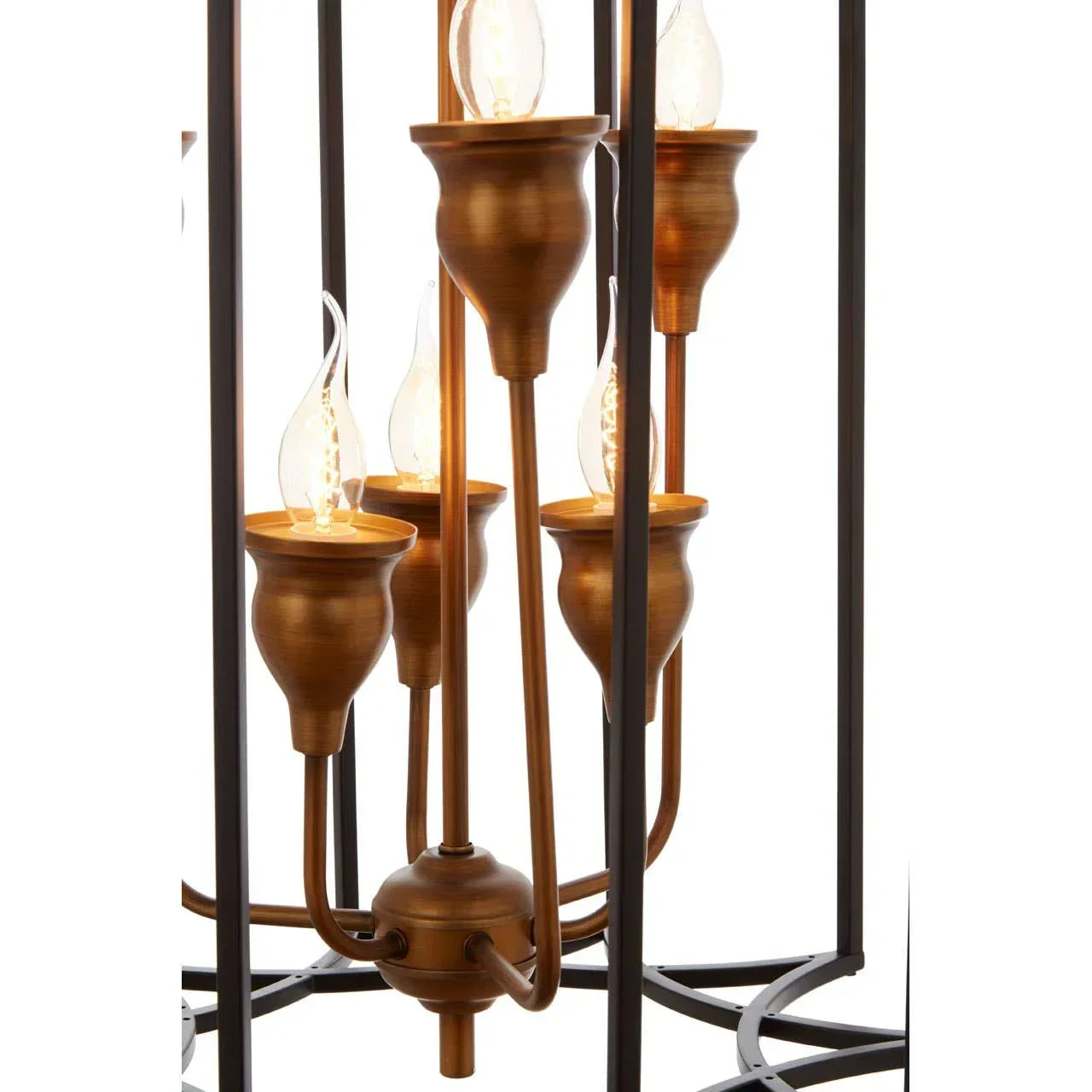 Antique brass chandelier with candle-style LED bulbs in black metal frame