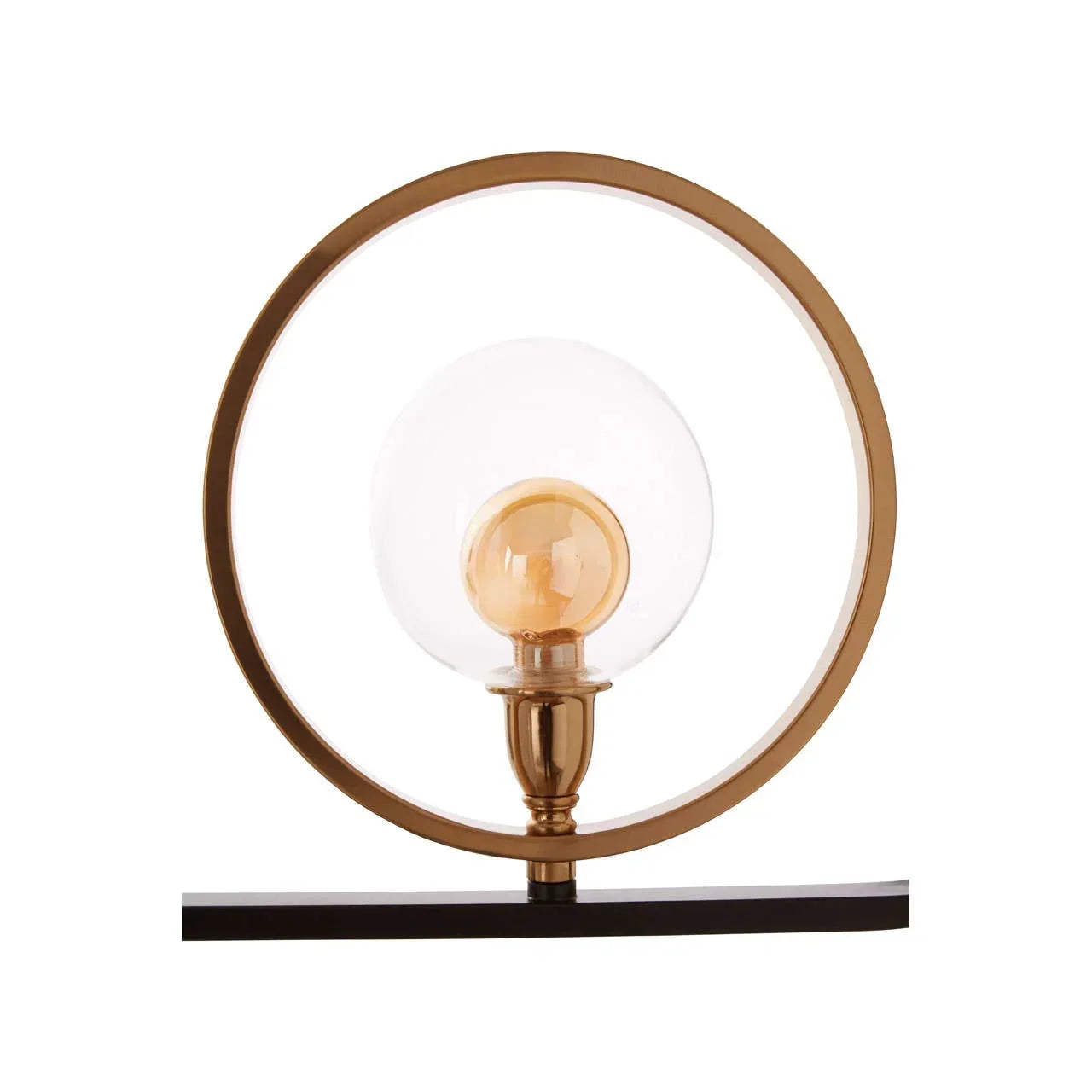 Gold table lamp with circular frame and glass globe shade on black base