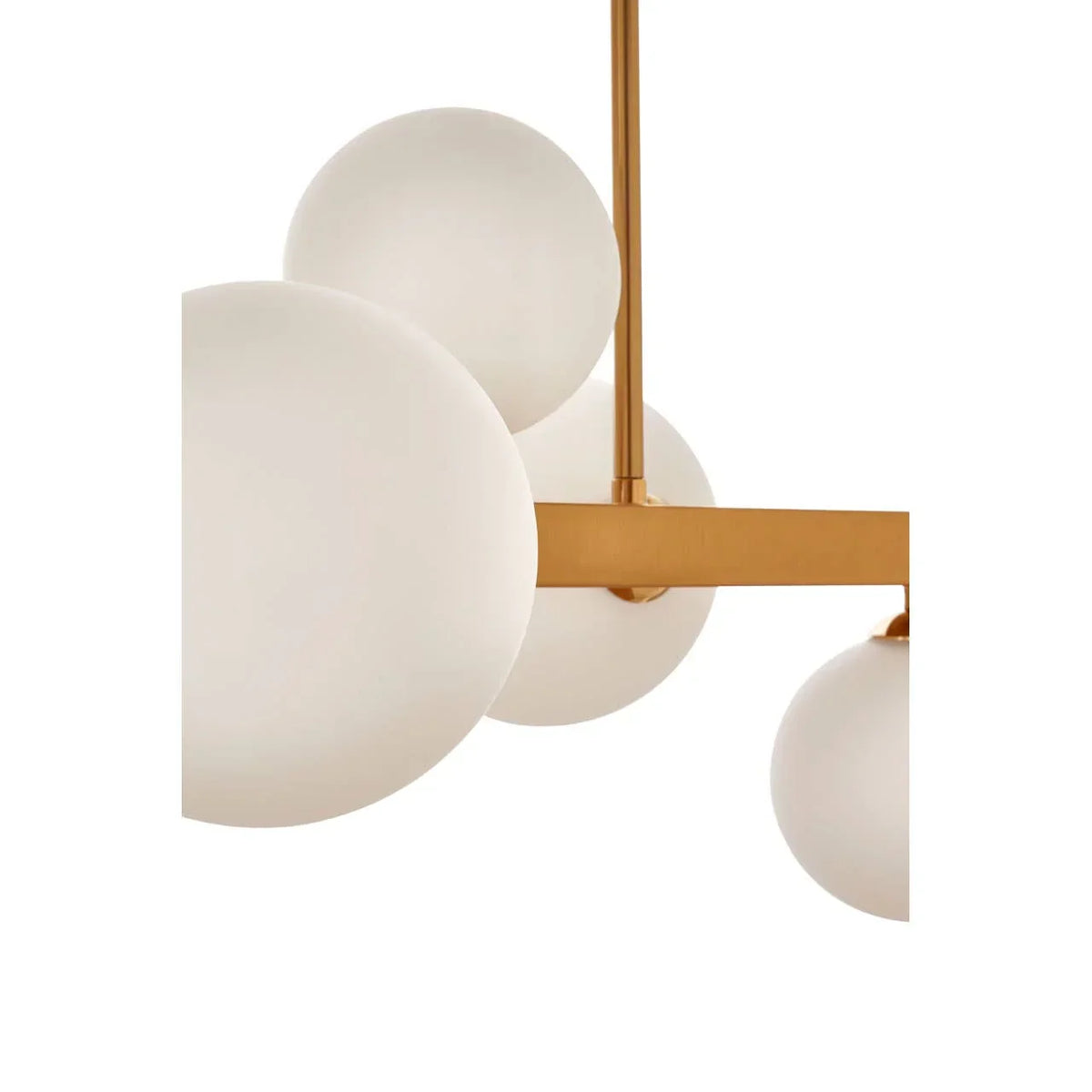 Modern ceiling light with gold frame and four frosted glass globes