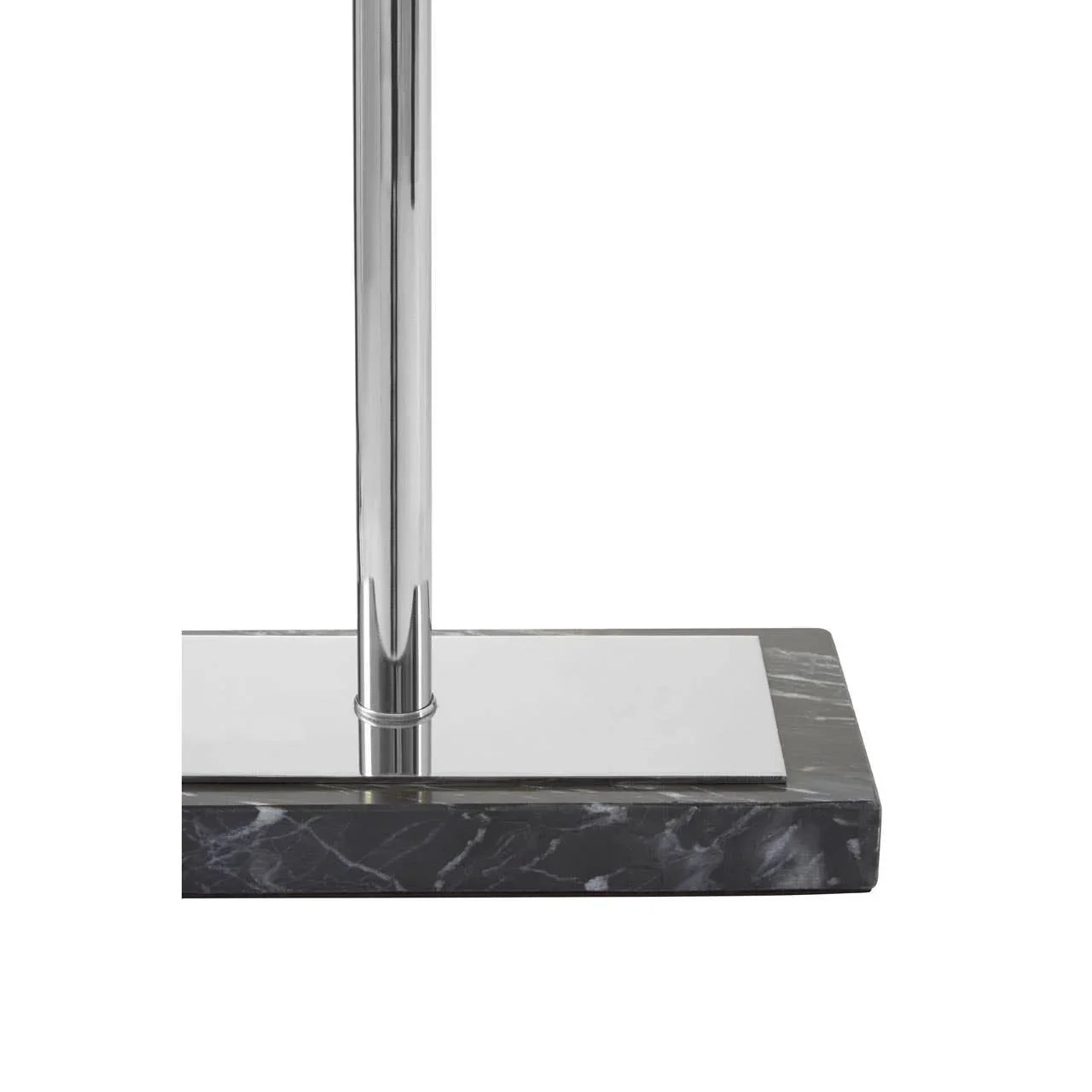 Chrome lamp stand with rectangular black marble base, close-up of materials and design