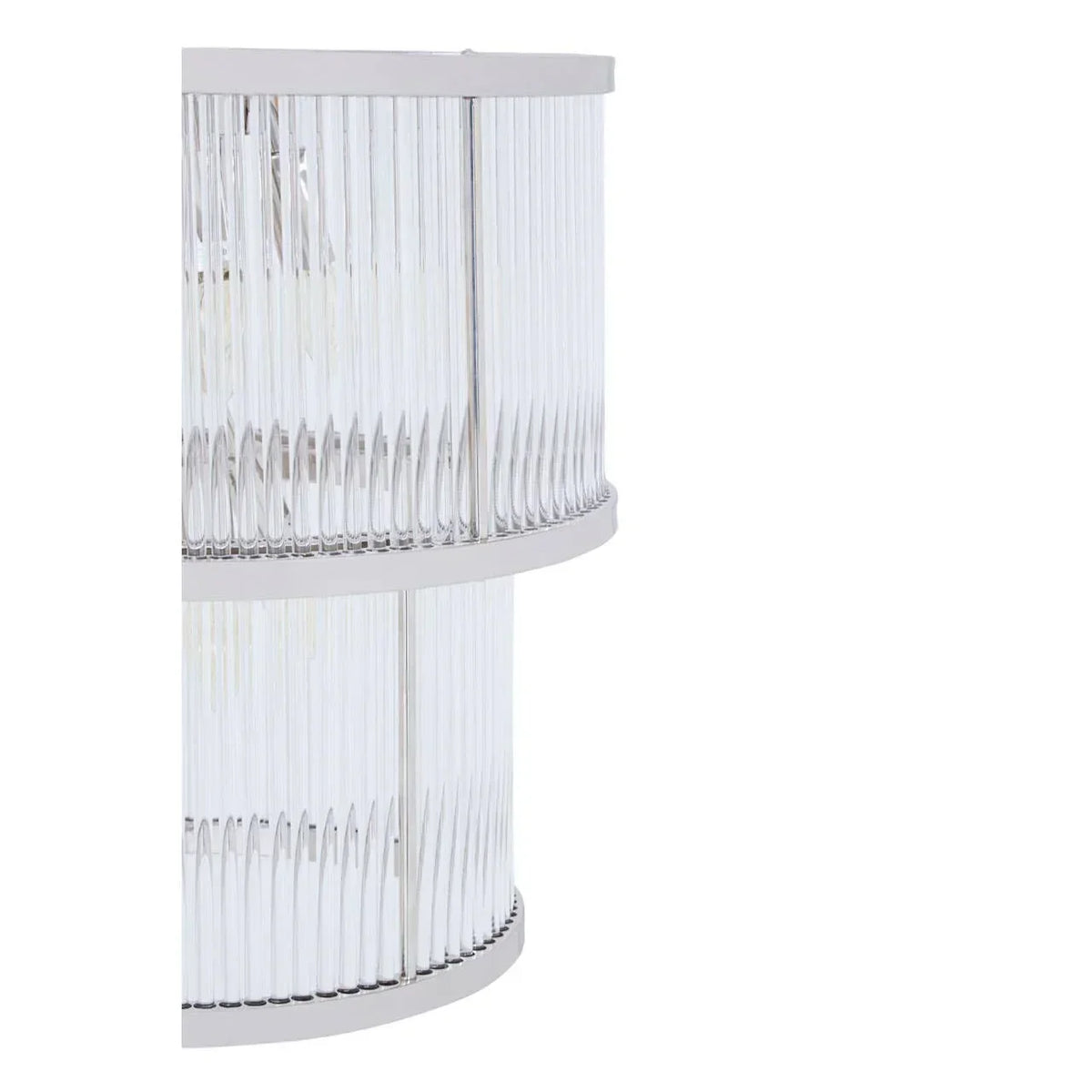 Close-up of modern glass and chrome wall light with vertical ribbed glass detailing