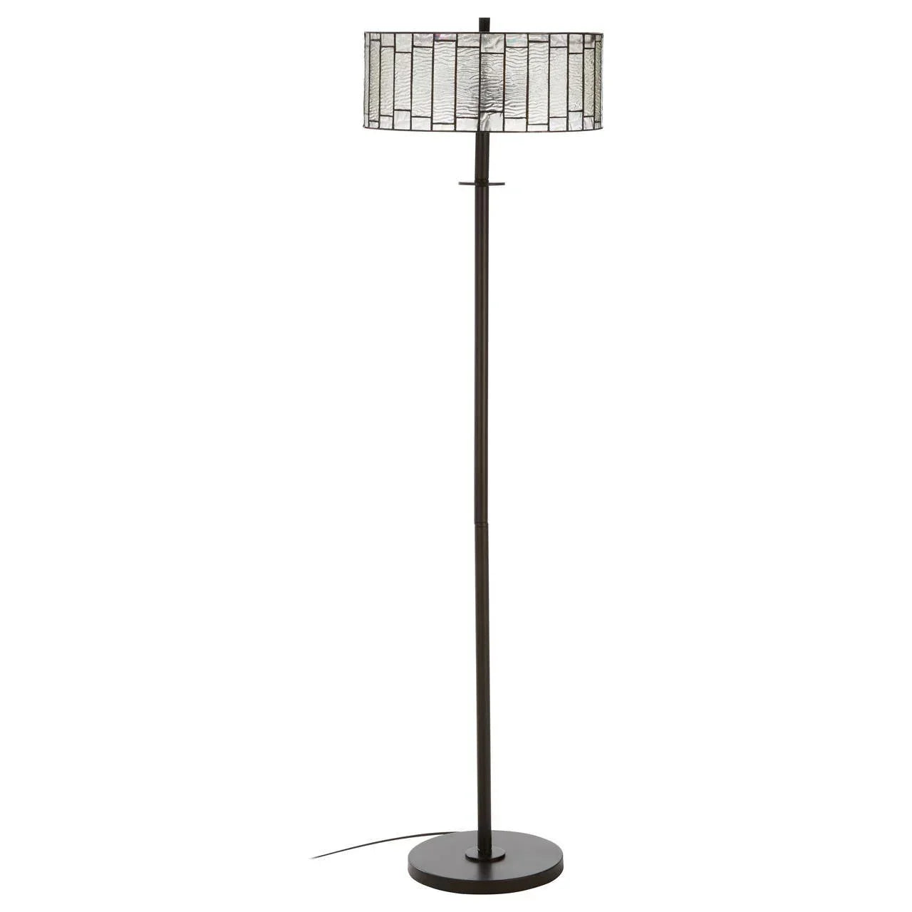 Black floor lamp with round stained glass shade and circular base