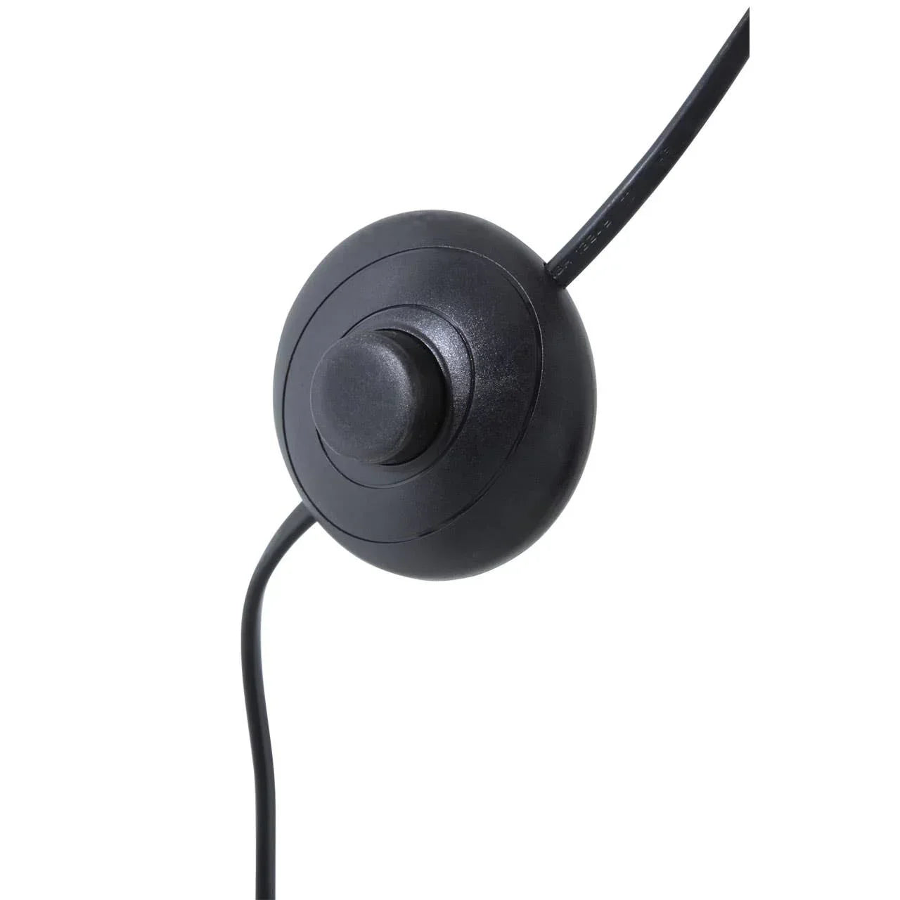 Black round floor lamp foot switch with cable, close-up view