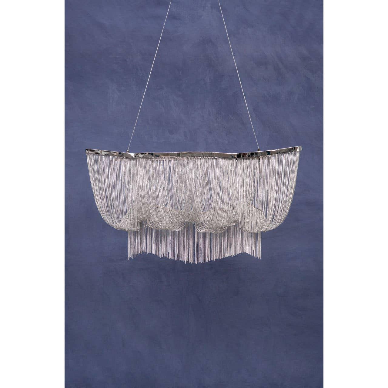 Silver chain fringe contemporary ceiling light against blue wall