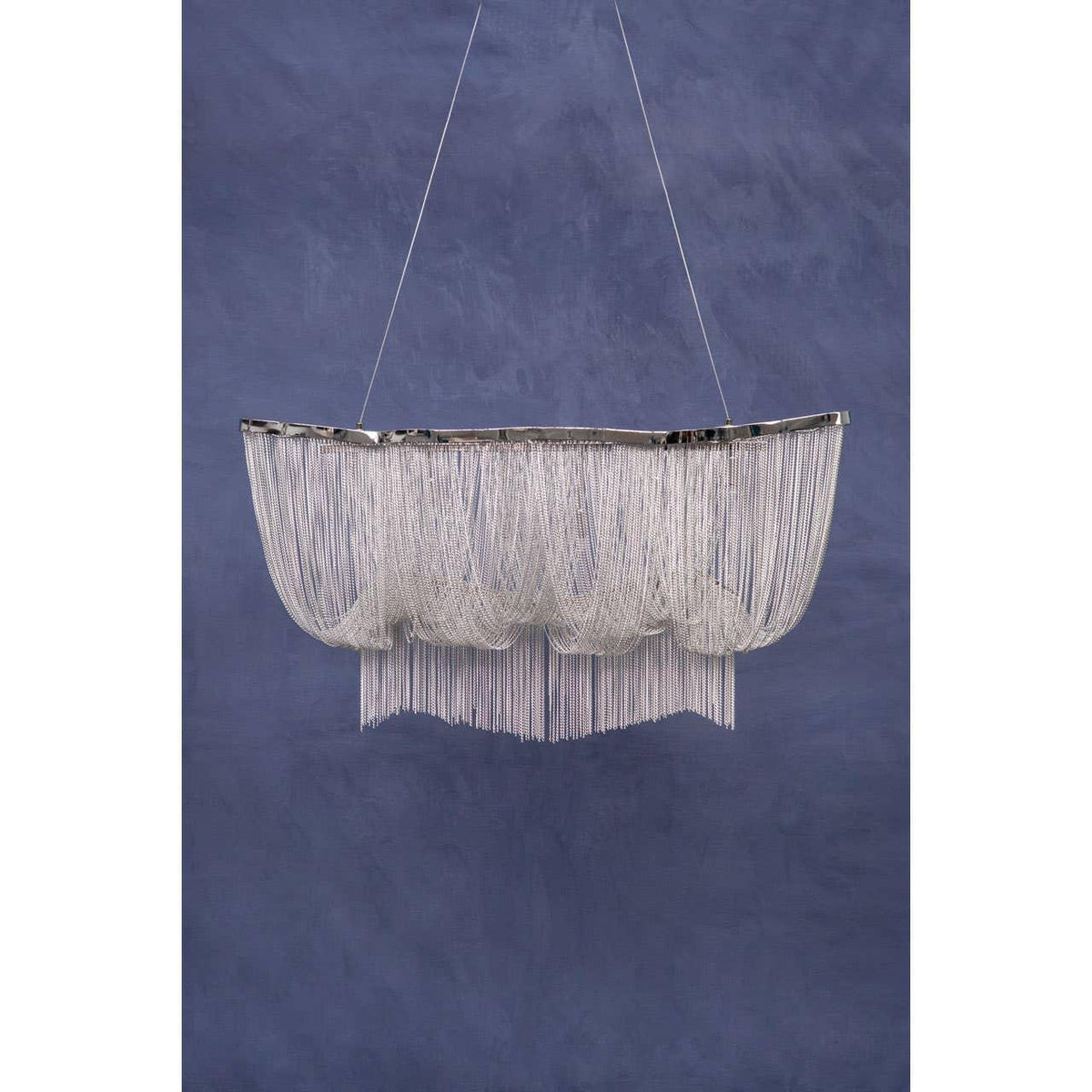 Silver chain fringe contemporary ceiling light against blue wall