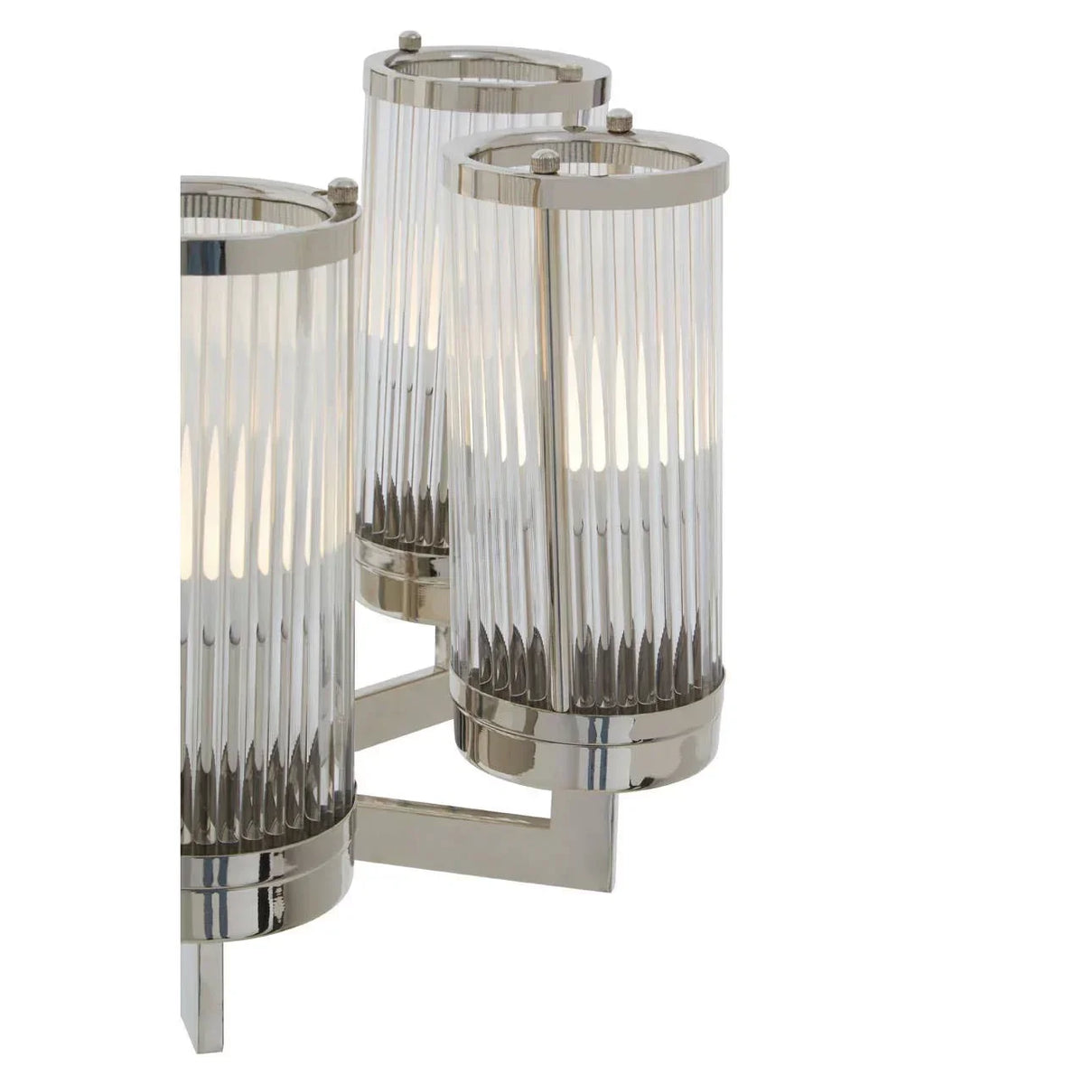 Modern wall light with three ribbed glass shades and polished chrome finish