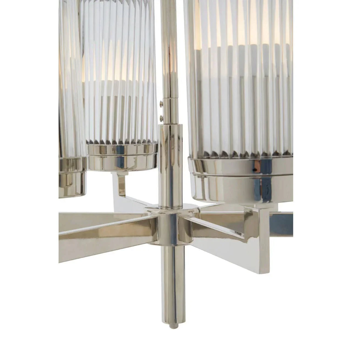 Close-up of modern chrome chandelier with ribbed glass lamp shades