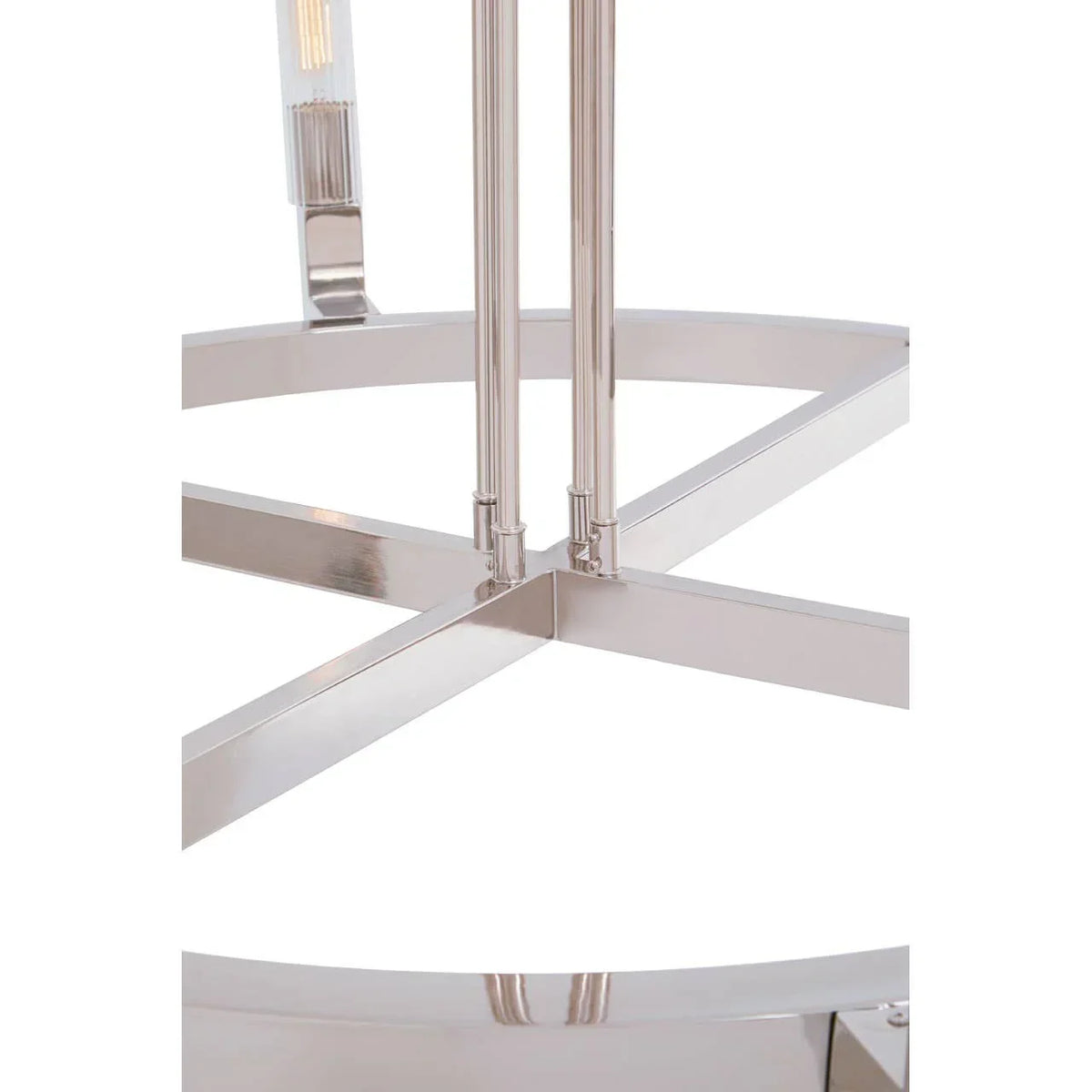Chrome metal table base with cross support legs and reflective finish, close-up view