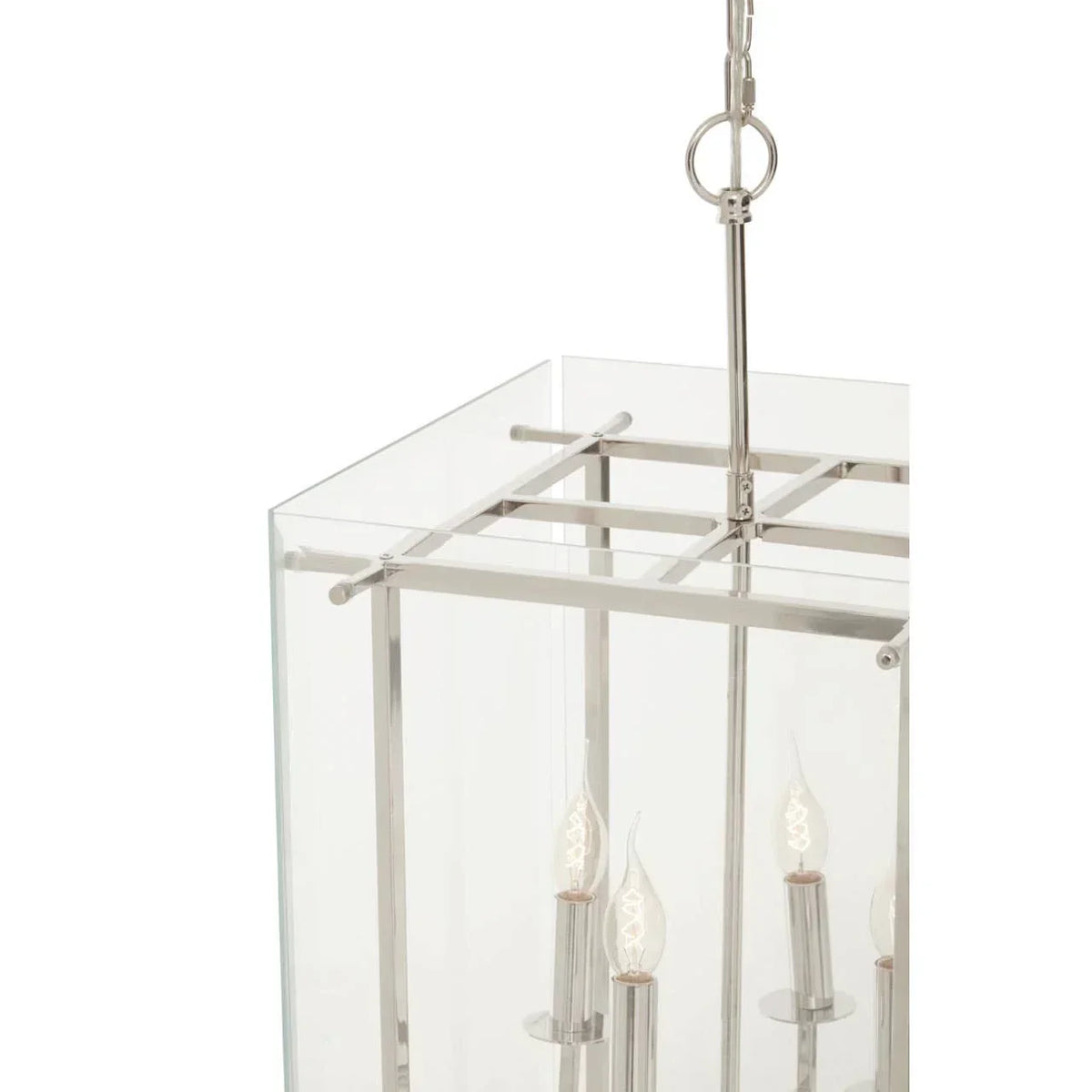 Glass pendant light with chrome frame and candle-style bulbs, close-up view