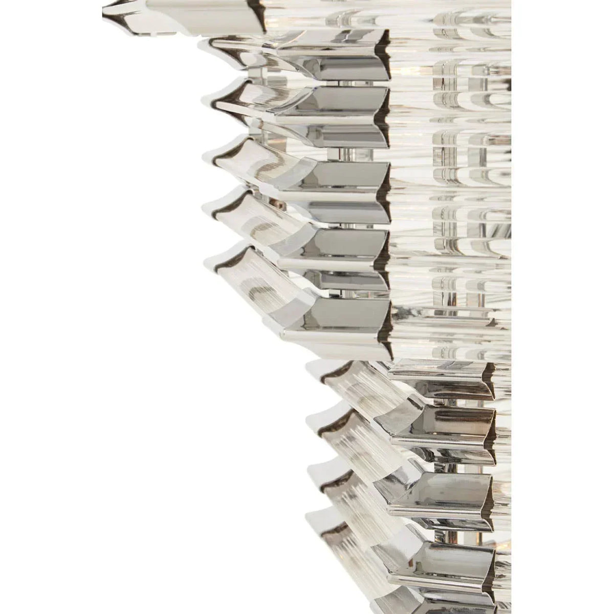 Close up of chrome and glass chandelier detail with layered crystal prisms