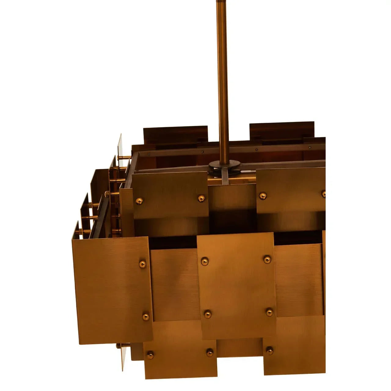 Brushed gold ceiling pendant light with layered geometric metal panels, close-up angle