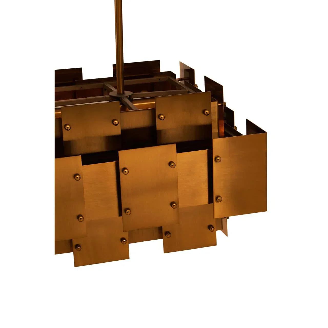 Brushed brass pendant light with geometric metal panels in close-up view