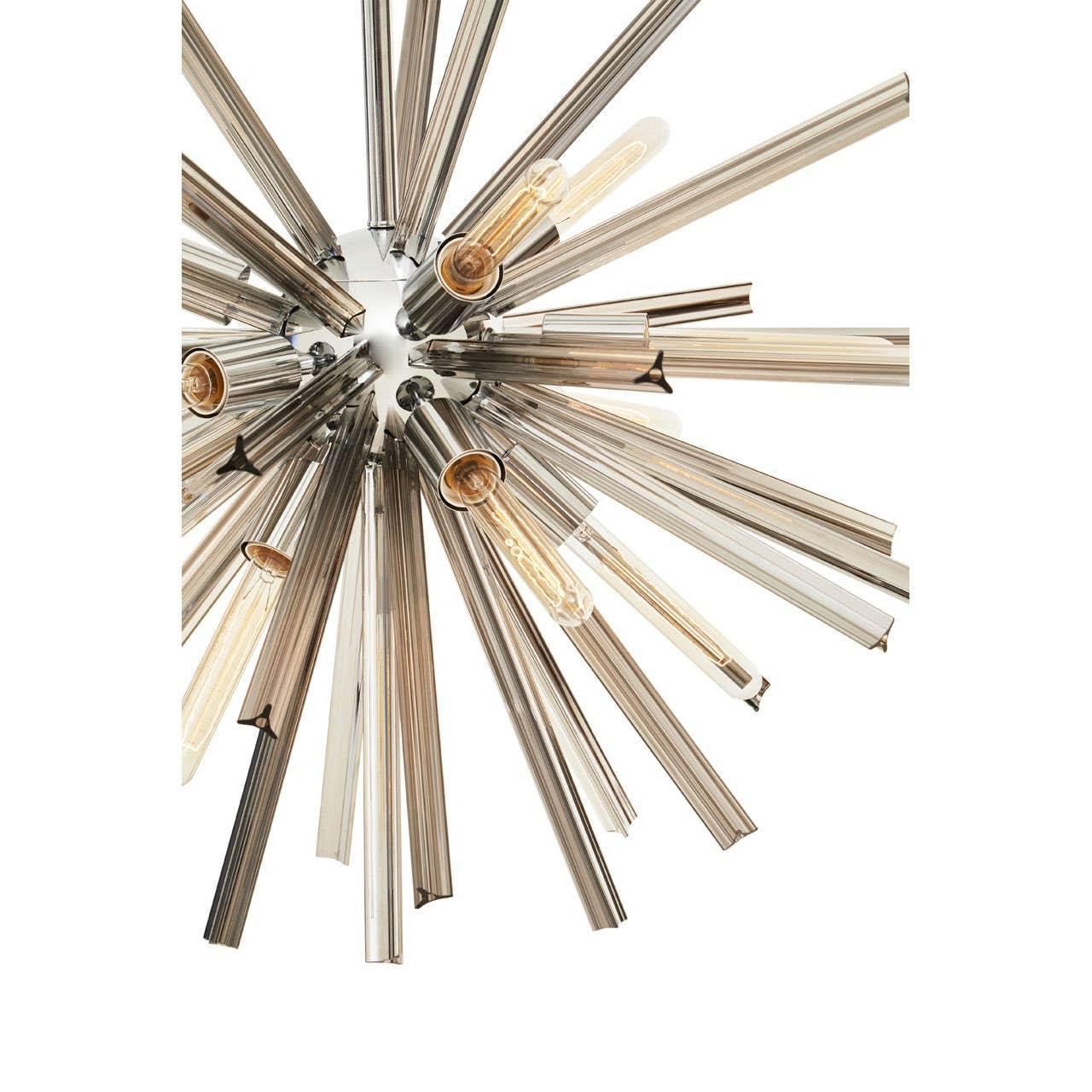 Modern chrome and glass sputnik chandelier with exposed filament bulbs viewed from below