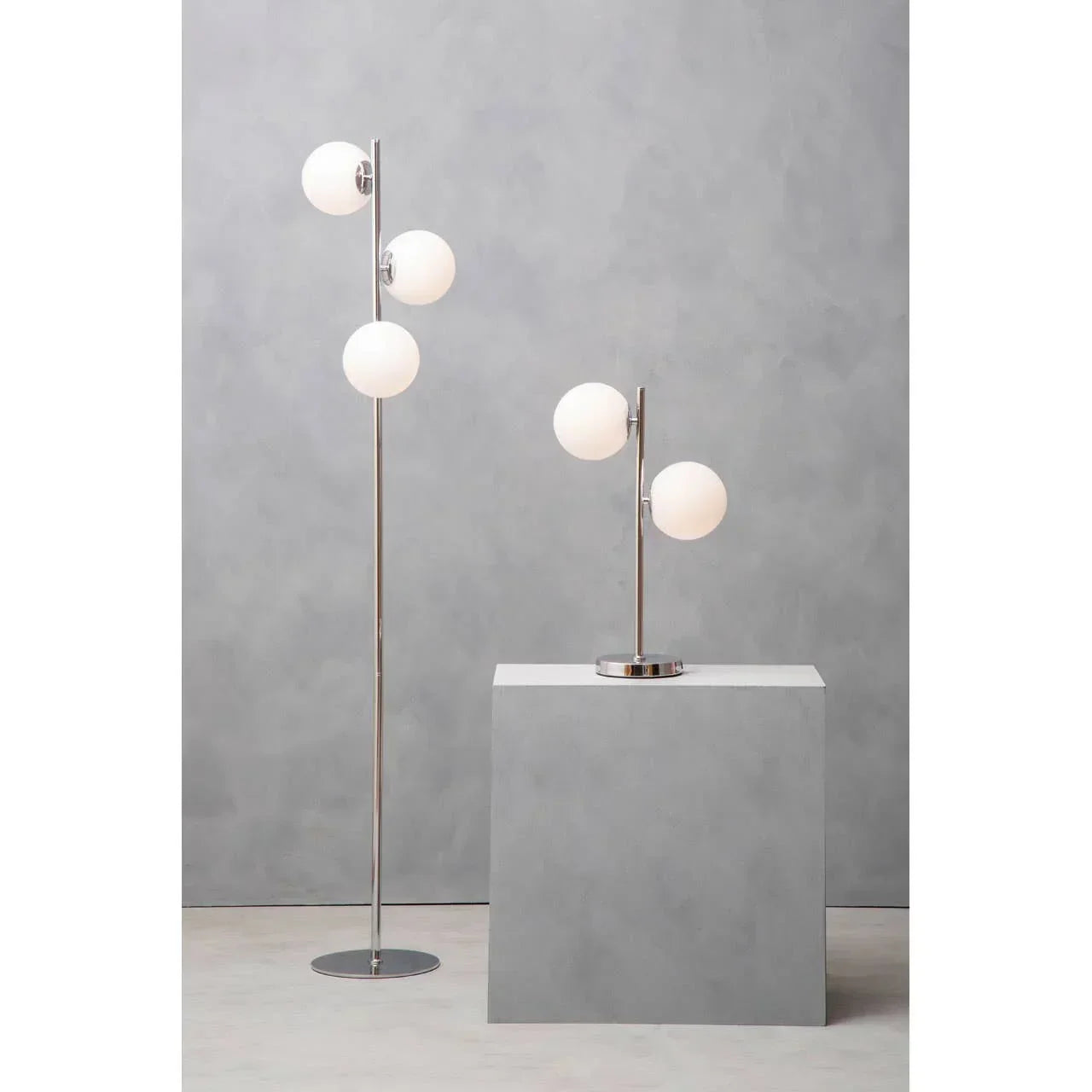 chrome floor lamp and matching table lamp with white glass globe shades