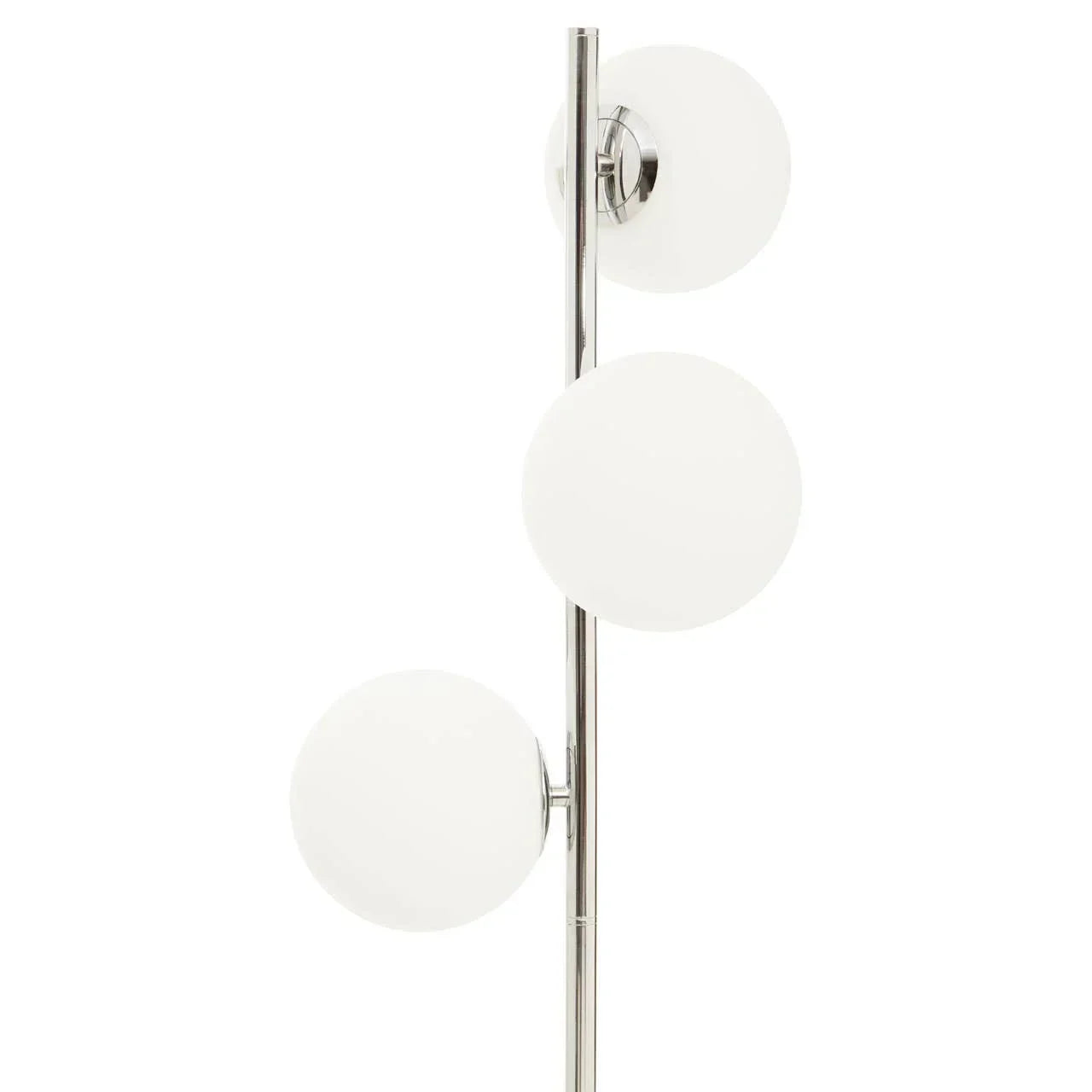 Modern floor lamp with three white glass globe shades on chrome stand