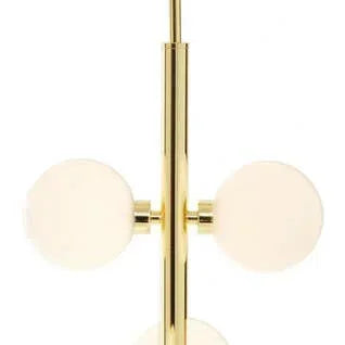 Gold pendant ceiling light with six white glass globe shades in vertical arrangement