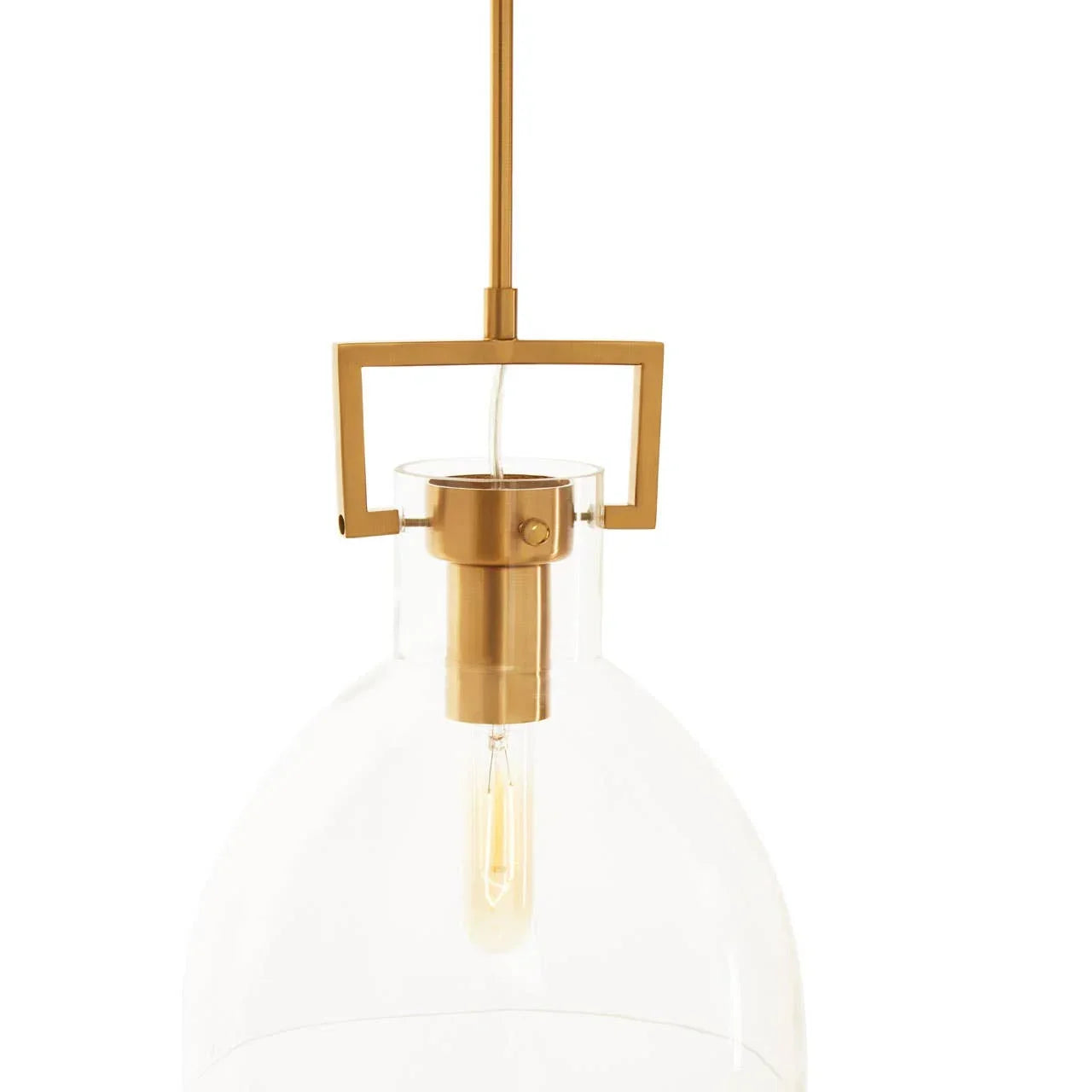 Glass pendant light with gold metal fixture and exposed bulb, close-up view