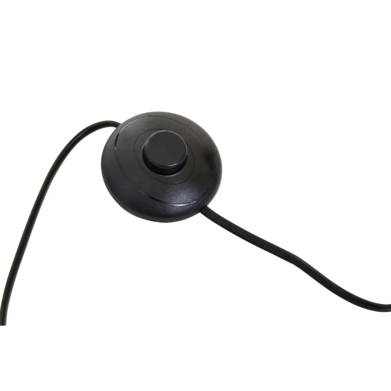 Black floor lamp foot switch with attached power cable on white background