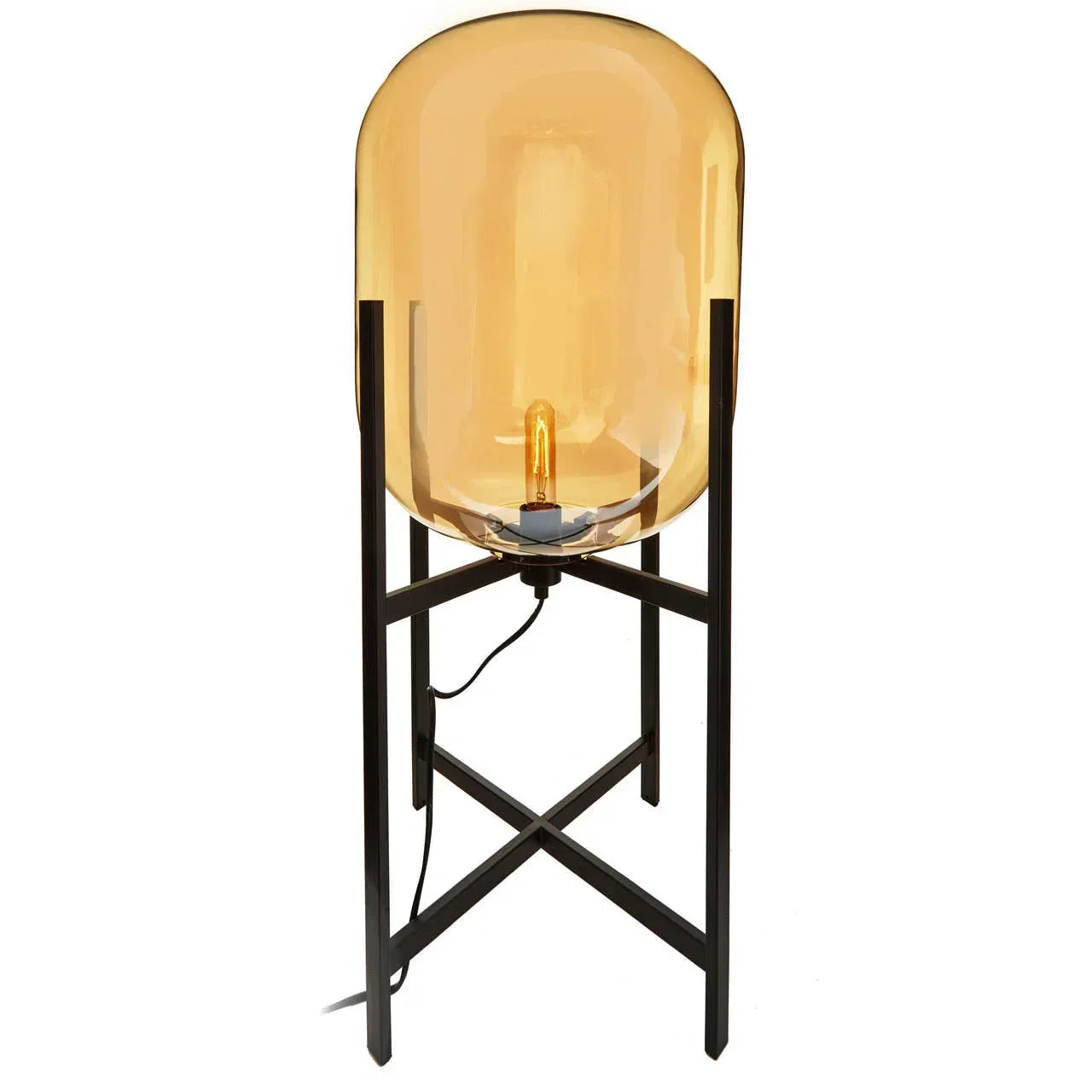 Amber glass table lamp with exposed bulb on black metal frame