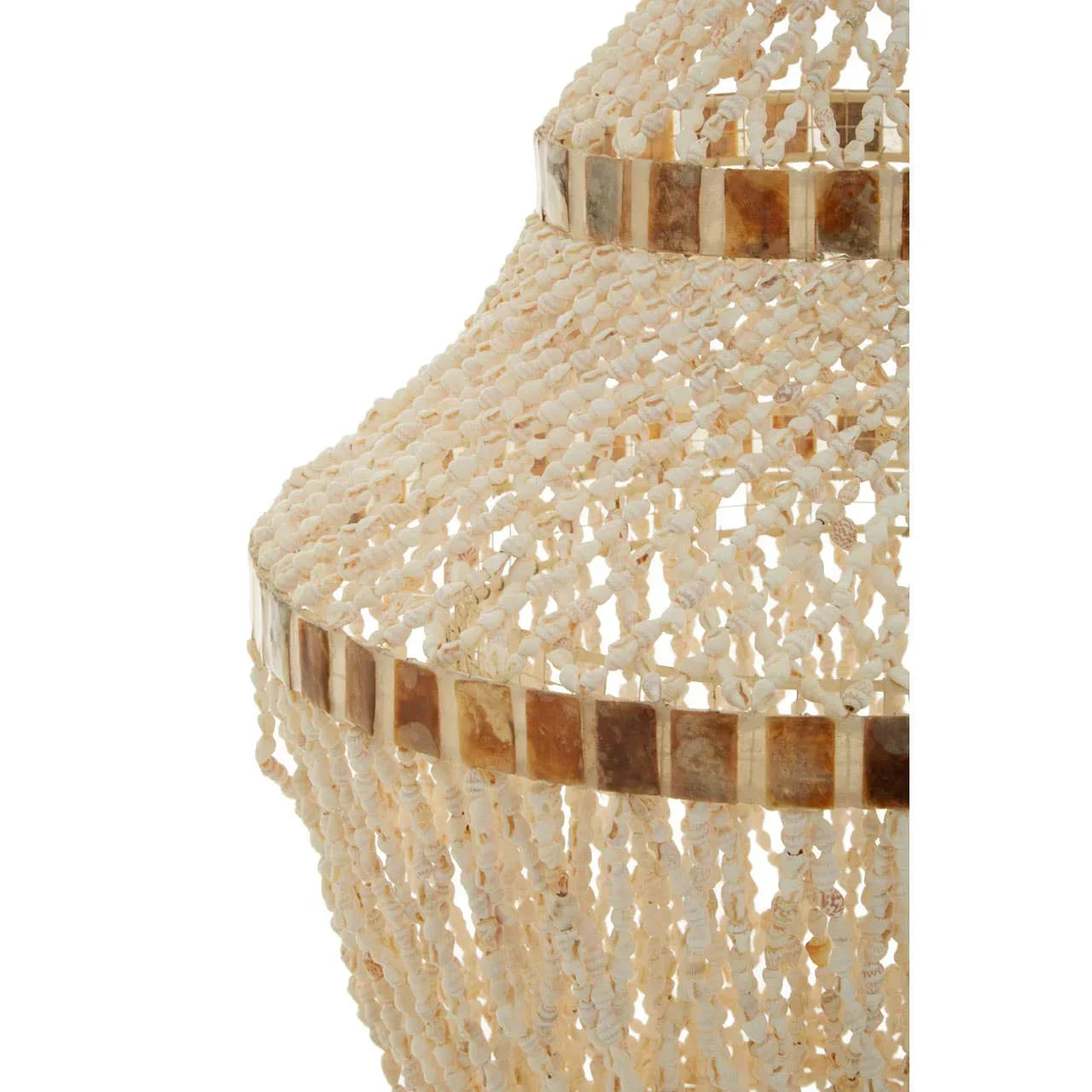 Closeup of beaded pendant light with natural shell detailing and neutral tones