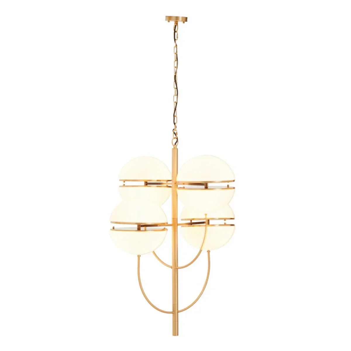 Brass pendant light with four white globe shades on an arched frame, hanging view