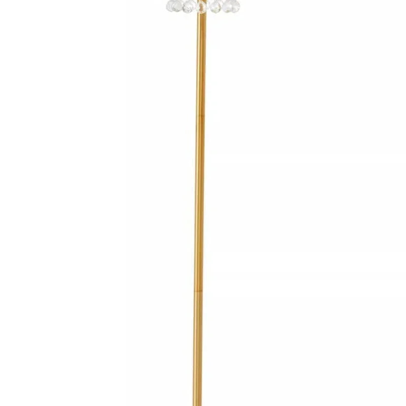 Gold floor lamp with crystal hanging accents and round base