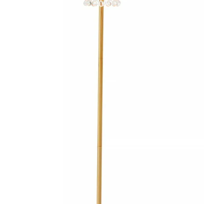 Gold floor lamp with crystal glass drop accents and round base