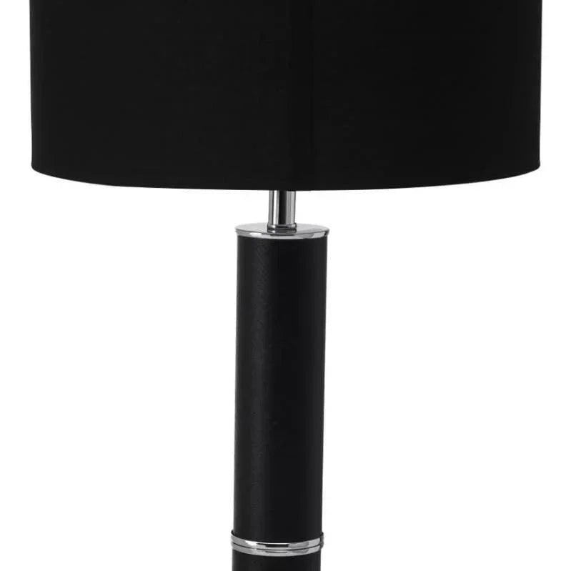 Black floor lamp with cylindrical shade and chrome accents