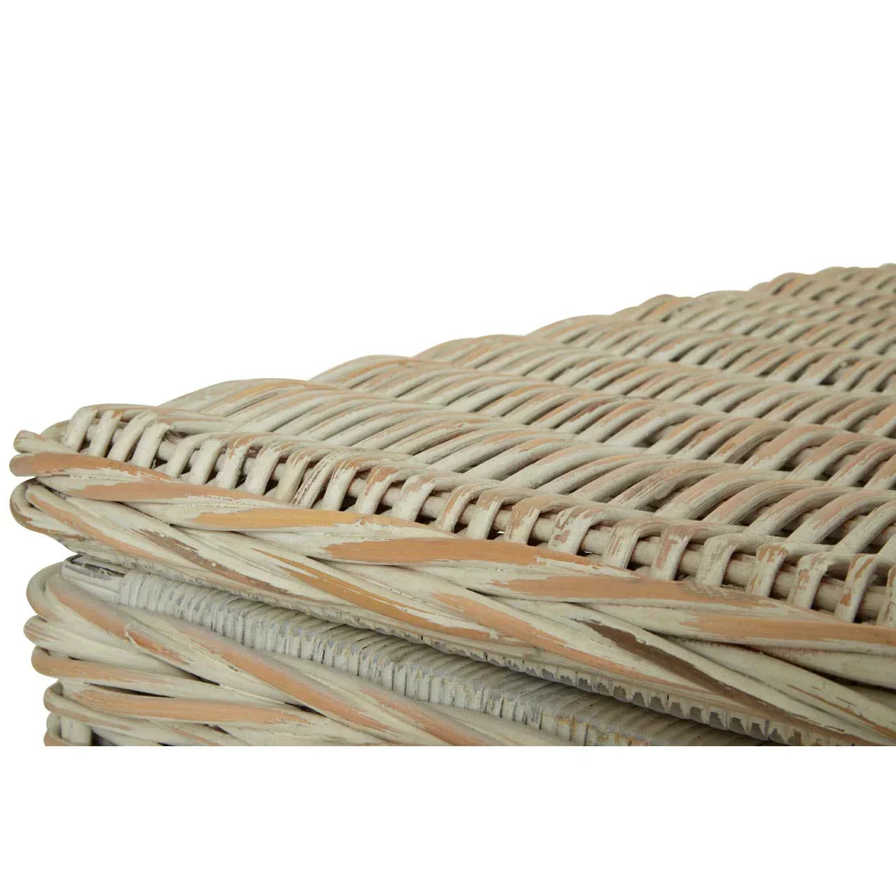 Close-up of light rattan basket texture with natural finish, showing woven furniture detail