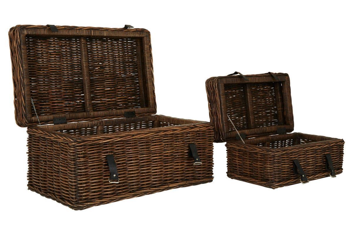 Brown wicker storage trunks with open lids, black handles, and metal clasps